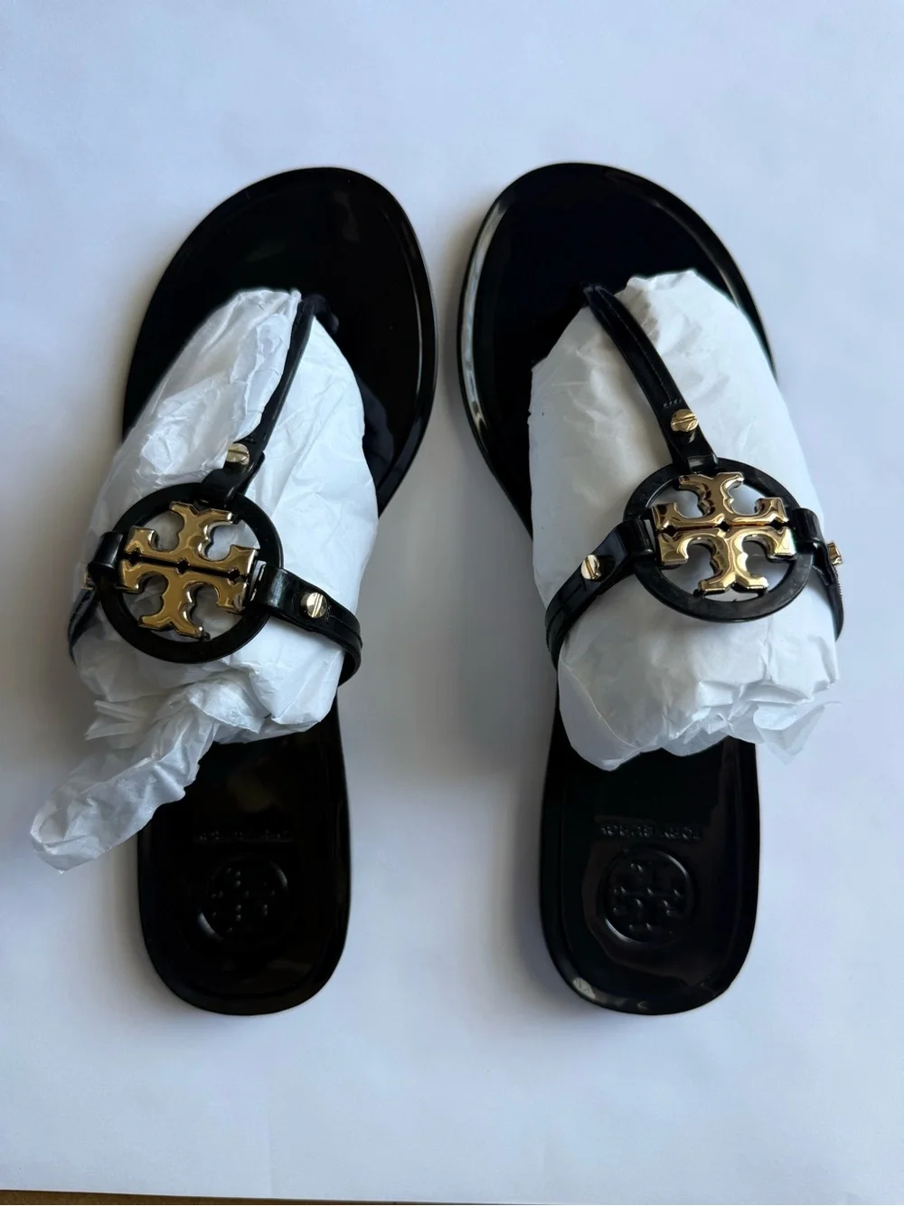 Tory Burch Black Jelly Thong Sandals with Gold Logo Emblem